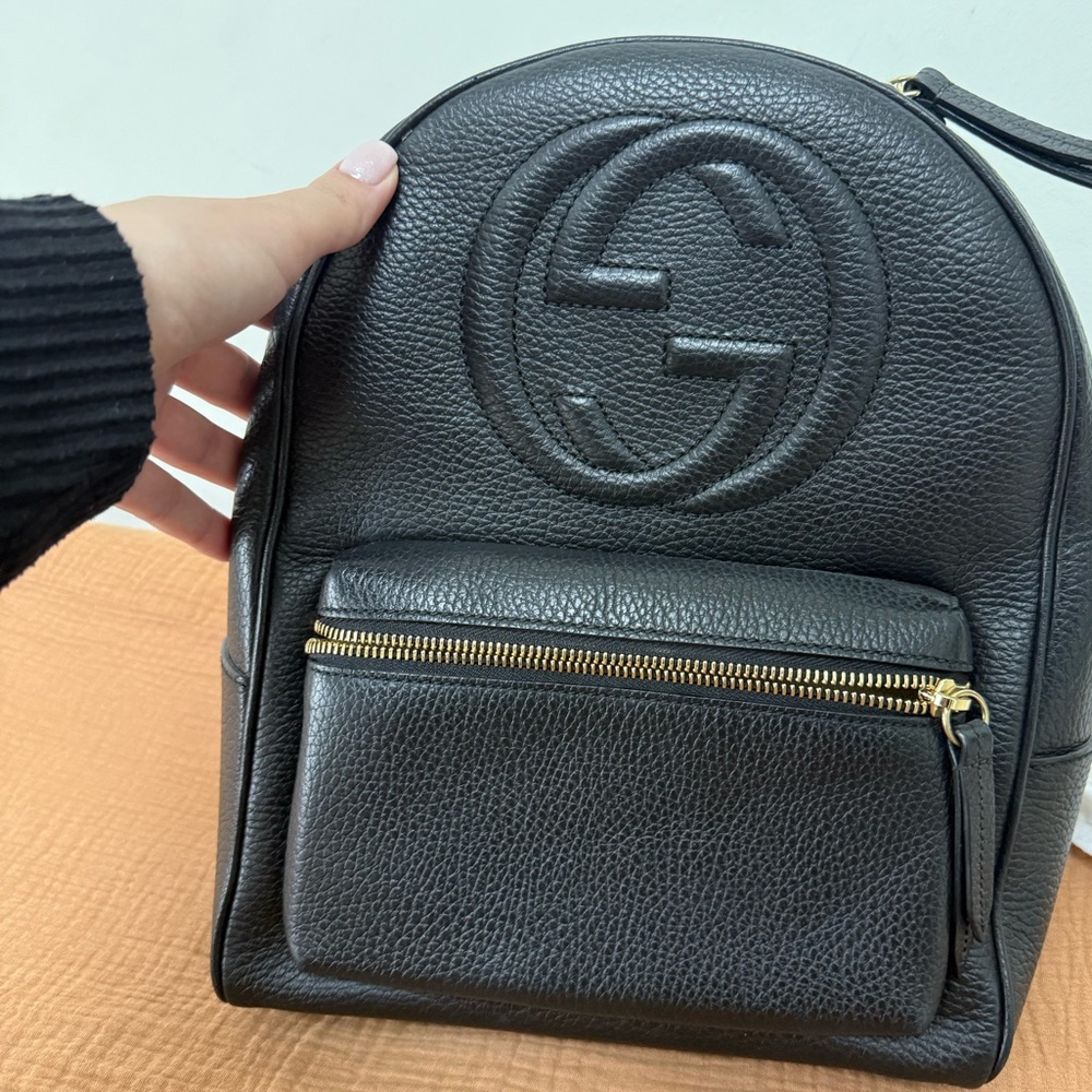 Gucci Black Leather Bag with Gold Accents